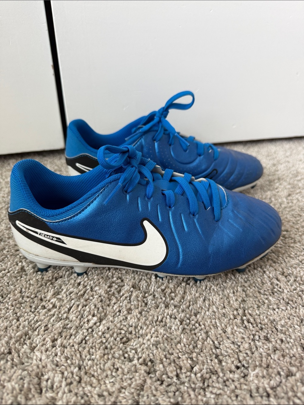 Nike Kids Blue sports cleats size 3.5